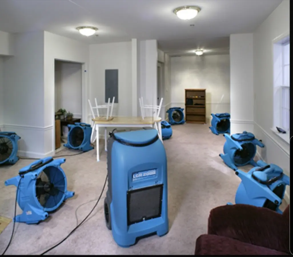 Air movers and dehumidifier setup for Water Damage Restoration in Wilson